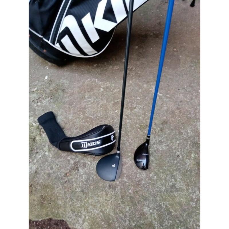 Junior golf clubs and stand bag