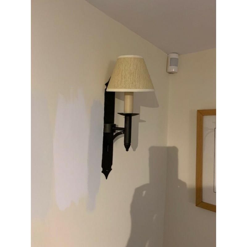 Wall lights by Jim Lawrence. 4 @ ?25 each. Collection Helmsley.