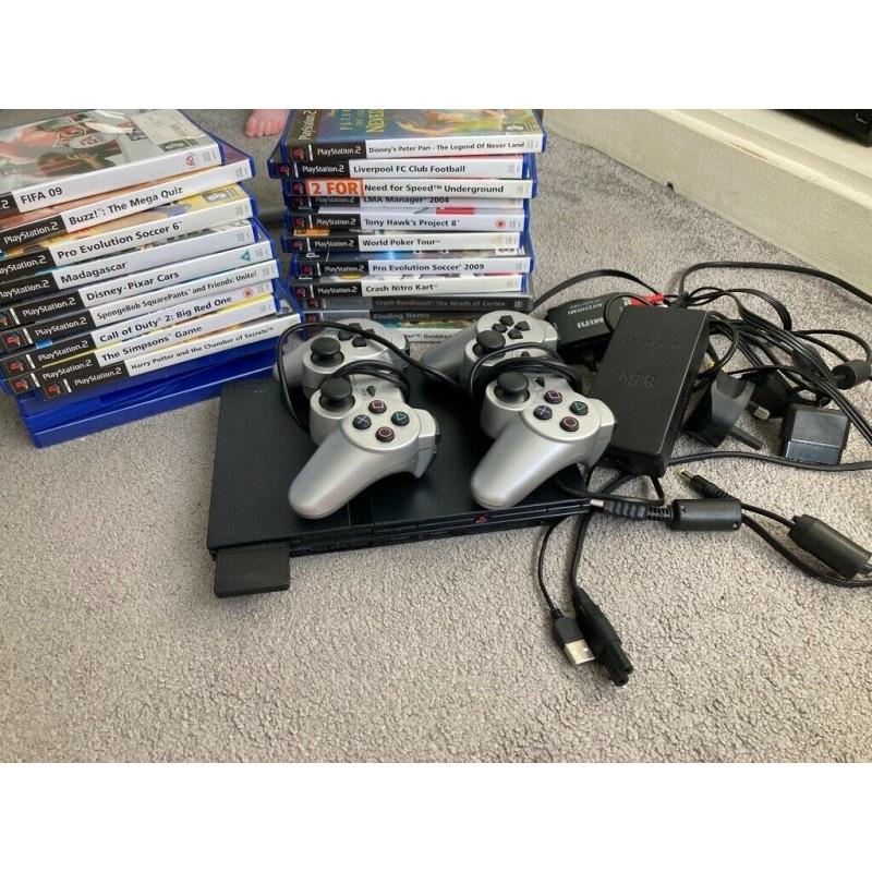 Ps2 with games and controllers