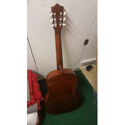 Acoustic Guitar - wooden - hardly used - great condition.