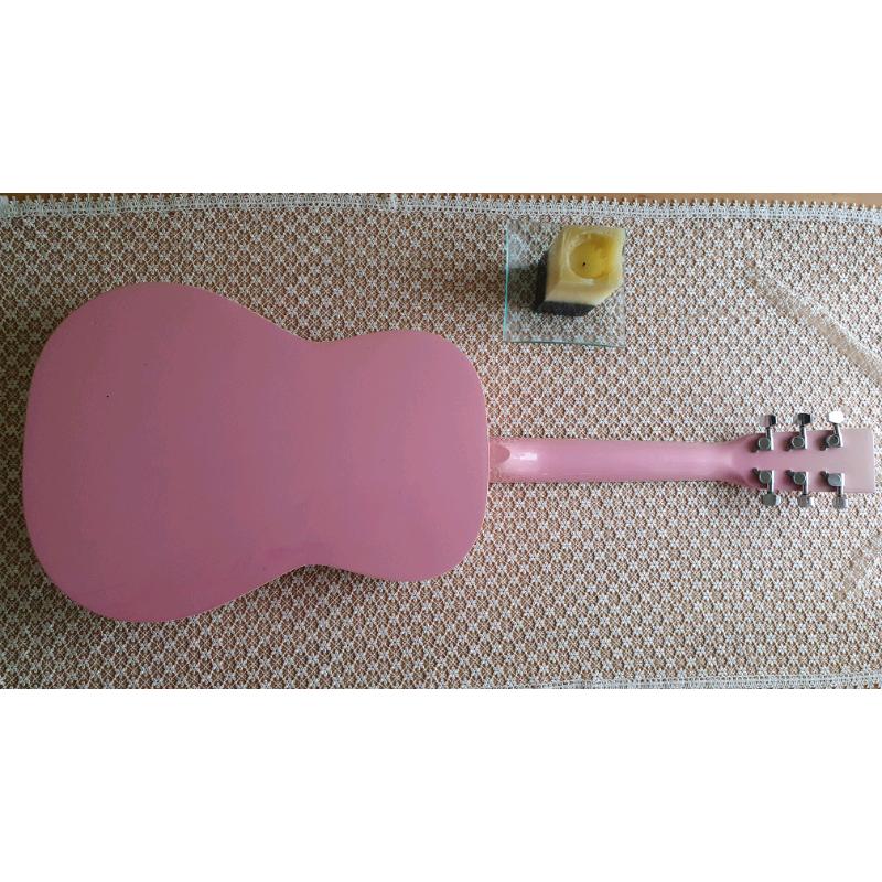 Pink acustic guitar