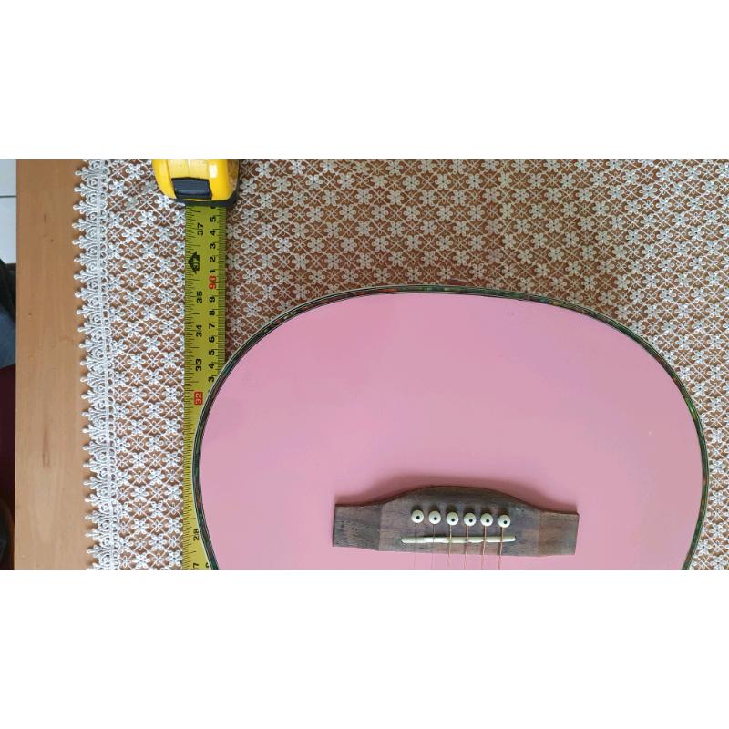 Pink acustic guitar